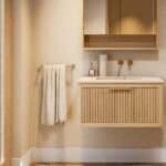 Het Hallberg badkamermeubel 80 in naturel eiken straalt warmte en karakter uit. De softclose-lade biedt praktische opbergruimte, terwijl de betonnen wastafel in Beige zorgt voor een elegante, tijdloze uitstraling. Een ambachtelijk meubel dat perfect