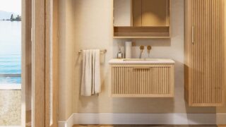 Het Hallberg badkamermeubel 80 in naturel eiken straalt warmte en karakter uit. De softclose-lade biedt praktische opbergruimte, terwijl de betonnen wastafel in Beige zorgt voor een elegante, tijdloze uitstraling. Een ambachtelijk meubel dat perfect