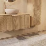 Rond naturel eiken badkamermeubel 100 cm met groevenfront, eiken blad en beige limestone waskom