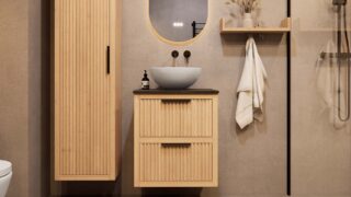 Compact eiken wastafelmeubel 60 cm met ribbelfront, twee lades en granieten blad met witte waskom