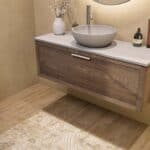 Hangend donker eiken badkamermeubel 120 cm met enkele wastafel, één lade en grijs limestone blad