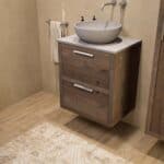 Hangend donker eiken badkamermeubel 60 cm met twee lades en grijs limestone blad