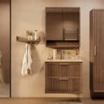 Het Riva badkamermeubel 80 in donker eiken ademt luxe en rust. Massief eiken met groevenfront, twee hoogwaardige softclose lades en een mat beige Mineraalsteen wastafel. De wastafel kan met of zonder kraangaten worden geleverd.