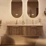 Het Riva badkamermeubel 140 in donker eiken ademt luxe en rust. Massief eiken met groevenfront, hoogwaardige softclose lades en een mat beige Mineraalsteen dubbel wastafel. De wastafel kan met of zonder kraangaten worden geleverd.