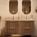 Het Riva badkamermeubel 140 in donker eiken ademt luxe en rust. Massief eiken met groevenfront, vier hoogwaardige softclose lades en een mat beige Mineraalsteen dubbele wastafel. De wastafel kan met of zonder kraangaten worden geleverd.