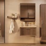 Het Riva badkamermeubel 80 in donker eiken ademt luxe en rust. Massief eiken met groevenfront, hoogwaardige softclose lades en een mat beige Mineraalsteen wastafel. De wastafel kan met of zonder kraangaten worden geleverd.