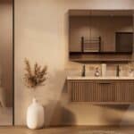 Het Riva badkamermeubel 120 in donker eiken ademt luxe en rust. Massief eiken met groevenfront, hoogwaardige softclose lades en een mat beige Mineraalsteen dubbel wastafel. De wastafel kan met of zonder kraangaten worden geleverd.