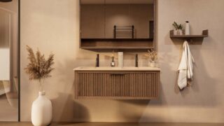 Het Riva badkamermeubel 120 in donker eiken ademt luxe en rust. Massief eiken met groevenfront, hoogwaardige softclose lades en een mat beige Mineraalsteen dubbel wastafel. De wastafel kan met of zonder kraangaten worden geleverd.