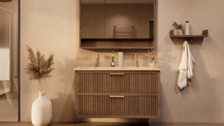 Het Riva badkamermeubel 120 in donker eiken ademt luxe en rust. Massief eiken met groevenfront, twee hoogwaardige softclose lades en een mat beige Mineraalsteen dubbele wastafel. De wastafel kan met of zonder kraangaten worden geleverd.