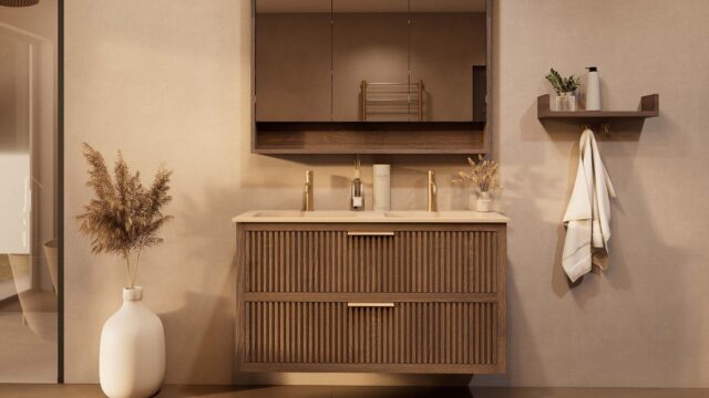Het Riva badkamermeubel 120 in donker eiken ademt luxe en rust. Massief eiken met groevenfront, twee hoogwaardige softclose lades en een mat beige Mineraalsteen dubbele wastafel. De wastafel kan met of zonder kraangaten worden geleverd.