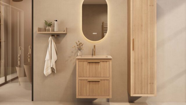 Het Riva badkamermeubel 60 in naturel eiken combineert ambachtelijk vakmanschap met moderne luxe. Gemaakt van massief eiken met ribbelfront, twee softclose lades en een mat beige Mineraalsteen wastafel. De wastafel kan met of zonder kraangaten worden