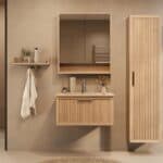 Het Riva badkamermeubel 80 in naturel eiken combineert ambachtelijk vakmanschap met moderne luxe. Gemaakt van massief eiken met ribbelfront, softclose lades en een mat beige Mineraalsteen wastafel. De wastafel kan met of zonder kraangaten worden gele