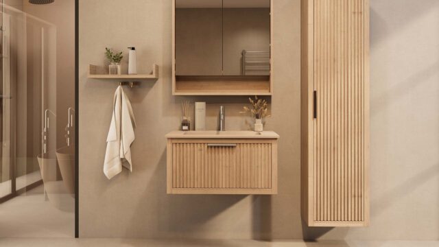 Het Riva badkamermeubel 80 in naturel eiken combineert ambachtelijk vakmanschap met moderne luxe. Gemaakt van massief eiken met ribbelfront, softclose lades en een mat beige Mineraalsteen wastafel. De wastafel kan met of zonder kraangaten worden gele