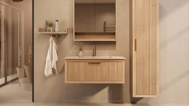Het Riva badkamermeubel 100 in naturel eiken combineert ambachtelijk vakmanschap met moderne luxe. Gemaakt van massief eiken met ribbelfront, softclose lades en een mat beige Mineraalsteen wastafel. De wastafel kan met of zonder kraangaten worden gel