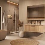 Het Riva badkamermeubel 120 in naturel eiken combineert ambachtelijk vakmanschap met moderne luxe. Gemaakt van massief eiken met ribbelfront, softclose lades en een dubbele mat beige Mineraalsteen wastafel. De wastafel kan met of zonder kraangaten wo