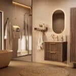 Het Riva badkamermeubel 70 in donker eiken ademt luxe en rust. Massief eiken met groevenfront, twee hoogwaardige softclose lades en een mat beige Mineraalsteen wastafel. De wastafel kan met of zonder kraangaten worden geleverd.