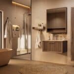 Het Riva badkamermeubel 80 in donker eiken ademt luxe en rust. Massief eiken met groevenfront, hoogwaardige softclose lades en een mat beige Mineraalsteen wastafel. De wastafel kan met of zonder kraangaten worden geleverd.