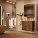Het Riva badkamermeubel 80 in donker eiken ademt luxe en rust. Massief eiken met groevenfront, twee hoogwaardige softclose lades en een mat beige Mineraalsteen wastafel. De wastafel kan met of zonder kraangaten worden geleverd.