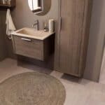 Modern donker eiken badkamermeubel 70 cm met één lade en Mat Beige mineraalstenen wastafel