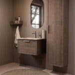 Modern donker eiken badkamermeubel 70 cm met één lade en Mat Beige mineraalstenen wastafel