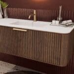 Rond donker eiken badkamermeubel 120 cm met groevenfront en mat witte solid surface wastafel