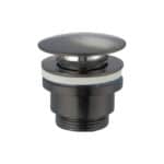 Wastafelkraan laag in black gun metal met duurzame PVD-coating, geleverd als complete set inclusief bijpassende clickwaste. De clickwaste is een handige pop-up afvoer die je eenvoudig opent en sluit door erop te drukken. Onderdeel van de Genève serie