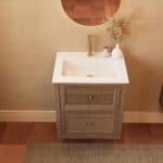 Modern donker eiken badkamermeubel 60 cm met twee lades en mat witte mineraalstenen wastafel